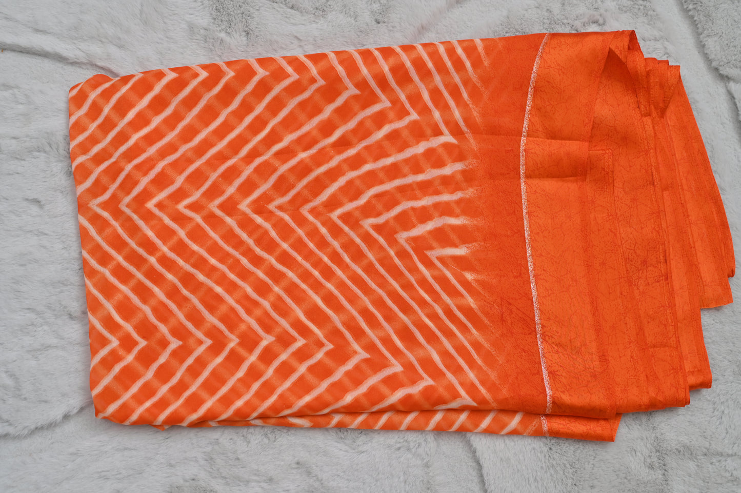 Sythentic Orange Zig Zag Lahariya Saree