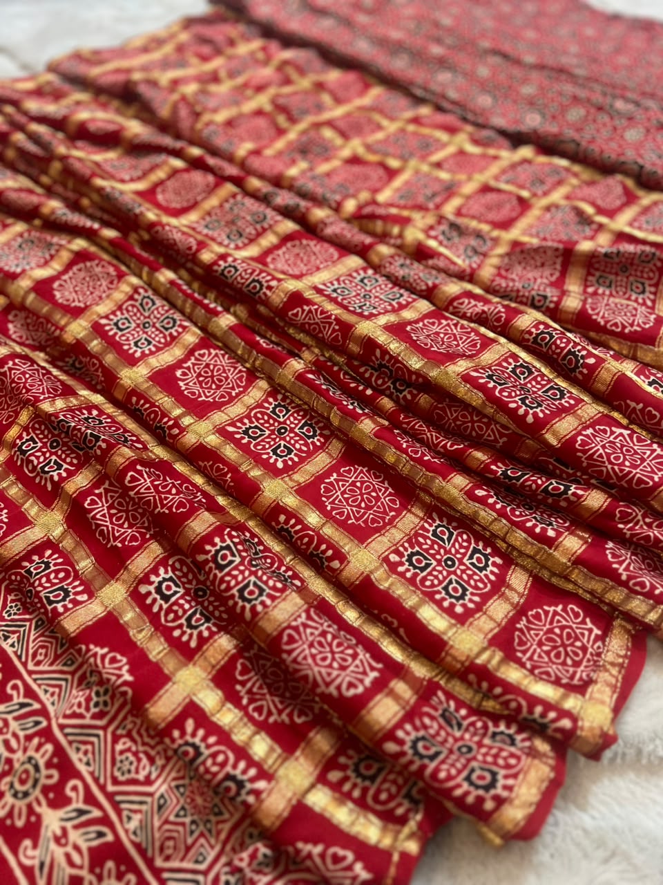 Beautiful Modal Silk Ajrakh checks Saree and same fabric Ajrakh  Blouse Piece