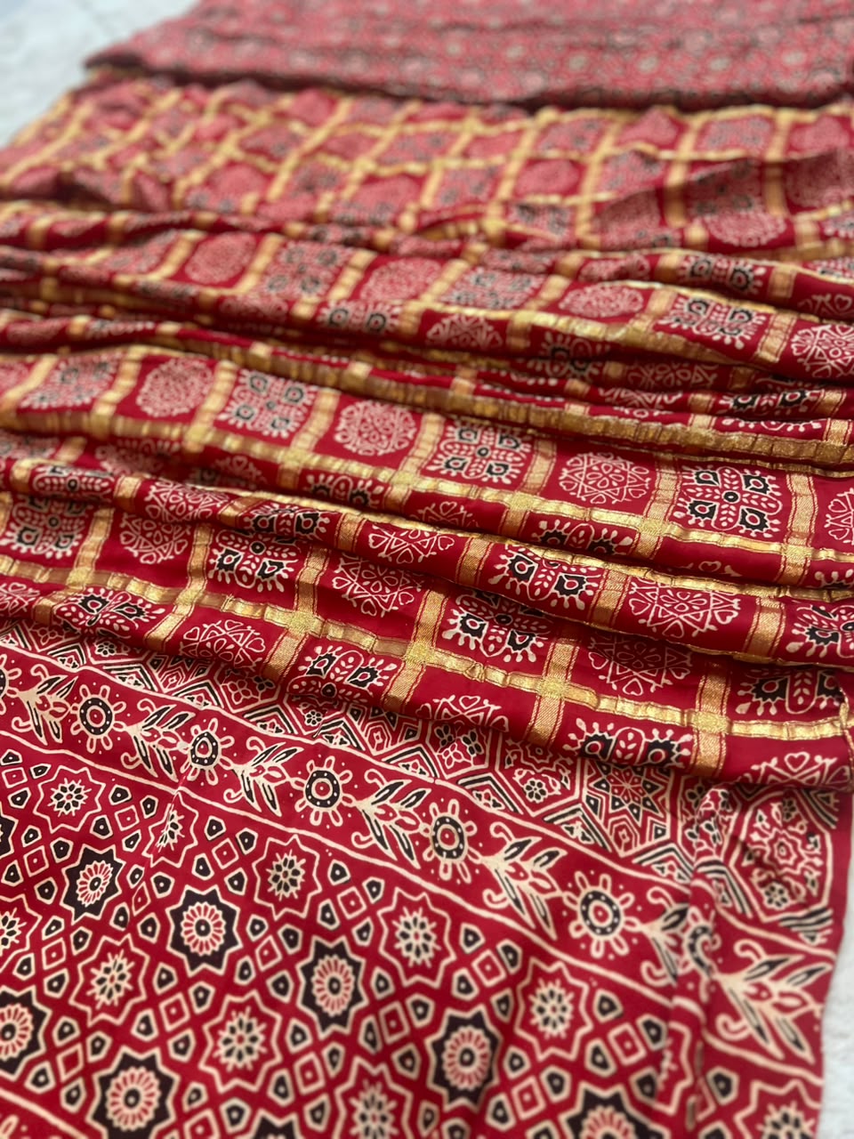 Beautiful Modal Silk Ajrakh checks Saree and same fabric Ajrakh  Blouse Piece