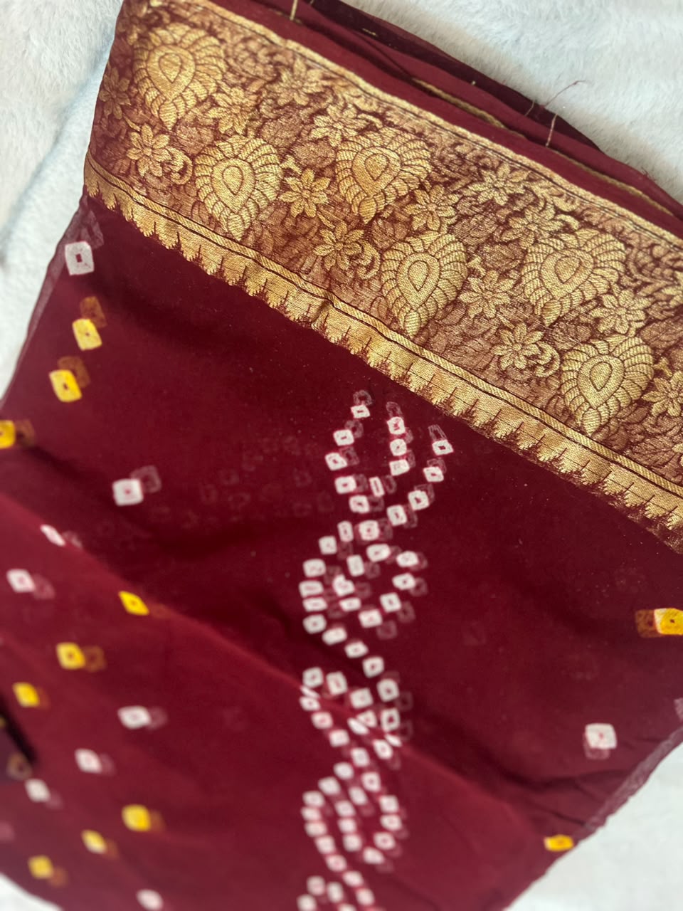 Pure Georgette Maroon Bandhini Saree with lovely Zari Border and Same Fabric Blouse Piece