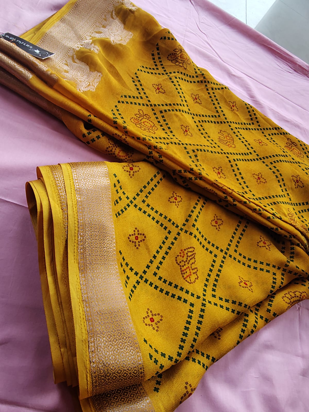Beautiful Yellow Color Bandhini Mosmelo Saree with Designer Border