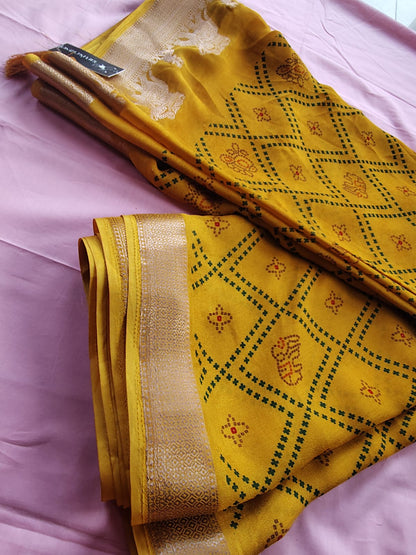Beautiful Yellow Color Bandhini Mosmelo Saree with Designer Border