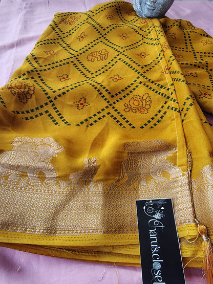 Beautiful Yellow Color Bandhini Mosmelo Saree with Designer Border