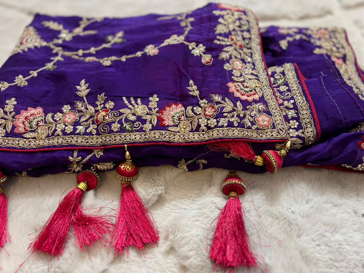 Heavy work Purple Silk Saree with Beautiful Tussles at the Pallu and Heavy Pink Contrast Blouse. You can call it Madhuri Dixit inspired “Hum Aapke hain Koun Saree “