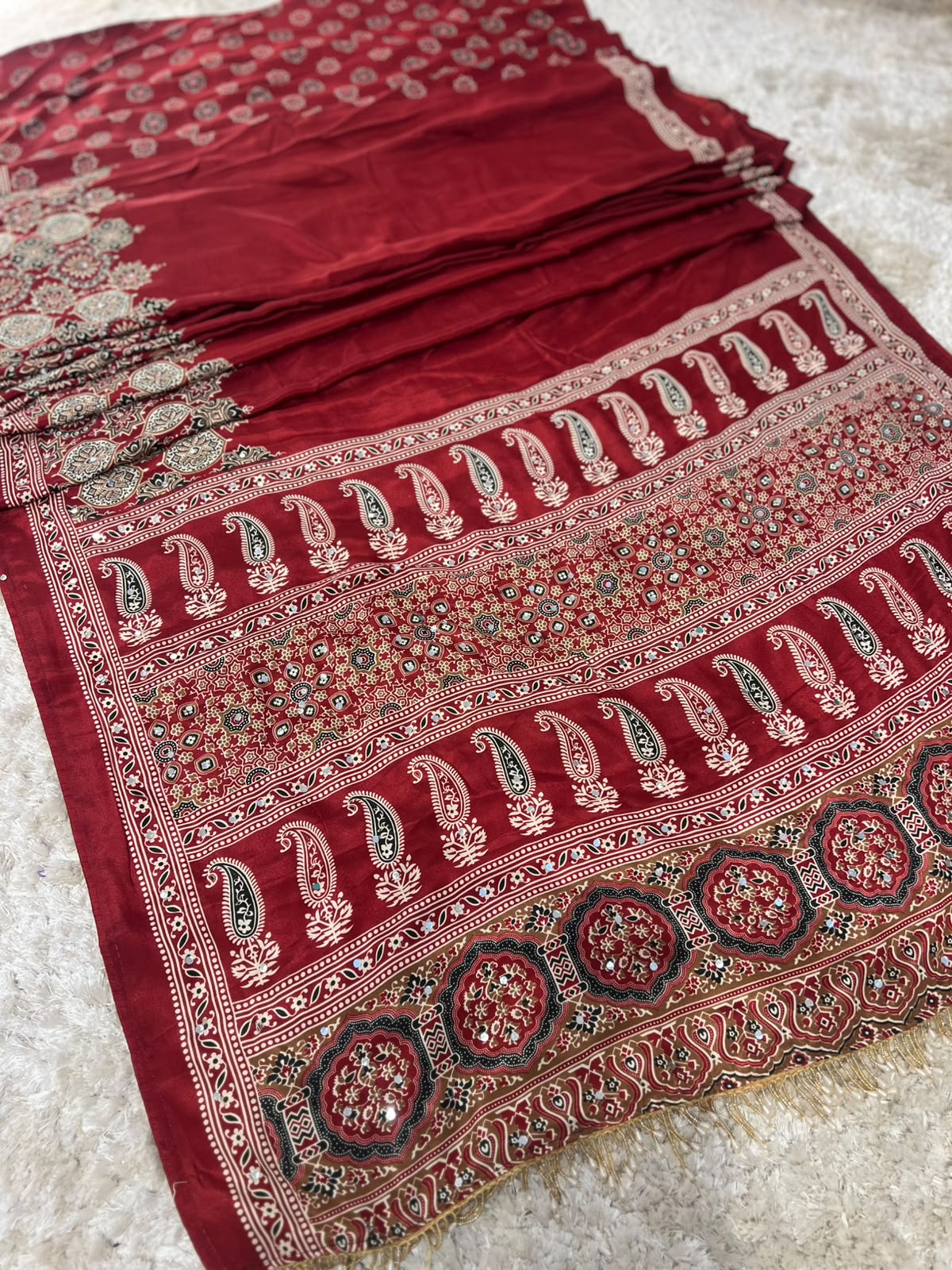 Beautiful Soft Crepe Ajrakh Print Maroon Color Saree with Mirror Work