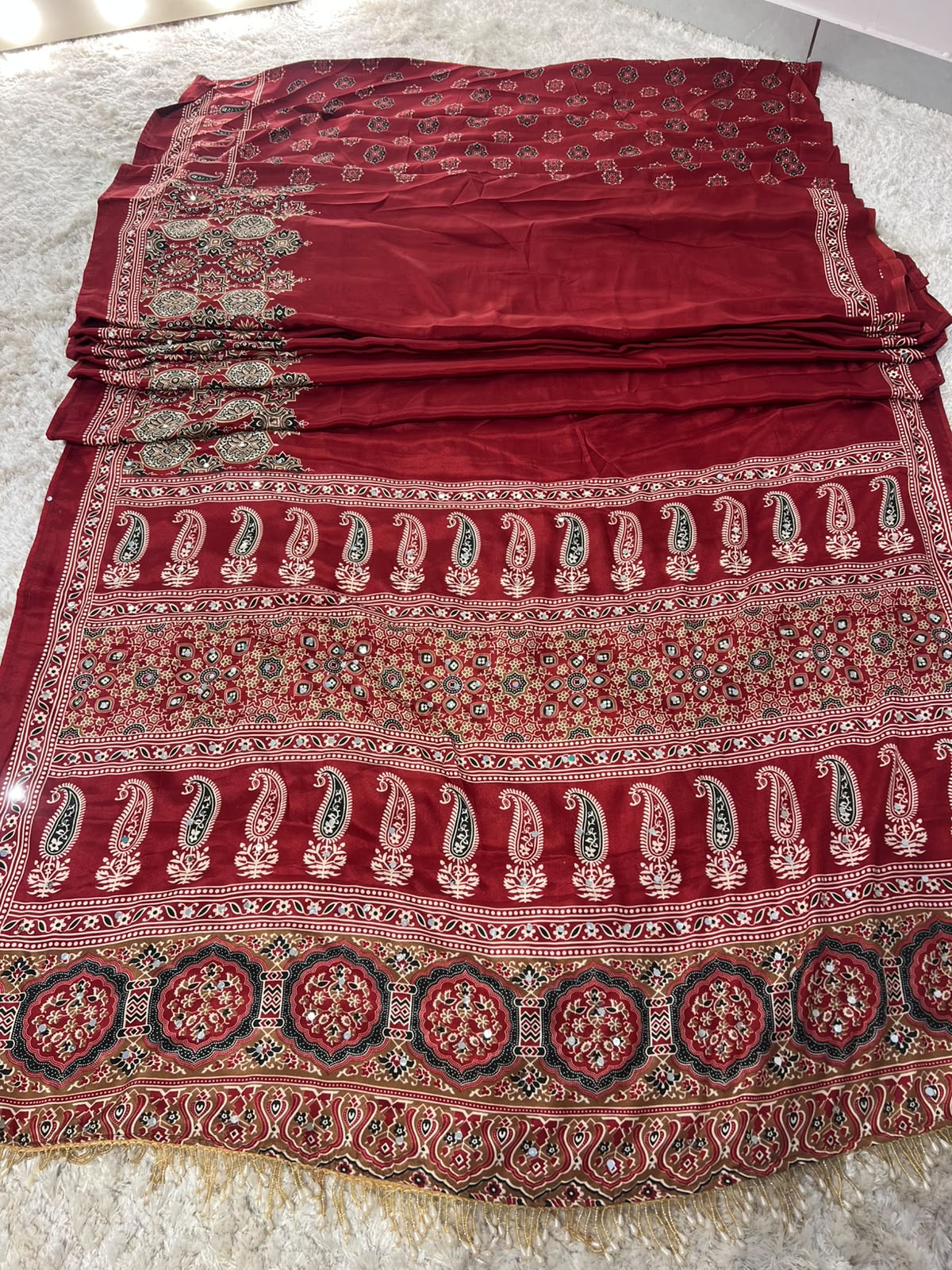 Beautiful Soft Crepe Ajrakh Print Maroon Color Saree with Mirror Work