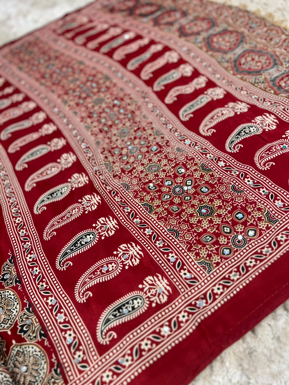 Beautiful Soft Crepe Ajrakh Print Maroon Color Saree with Mirror Work