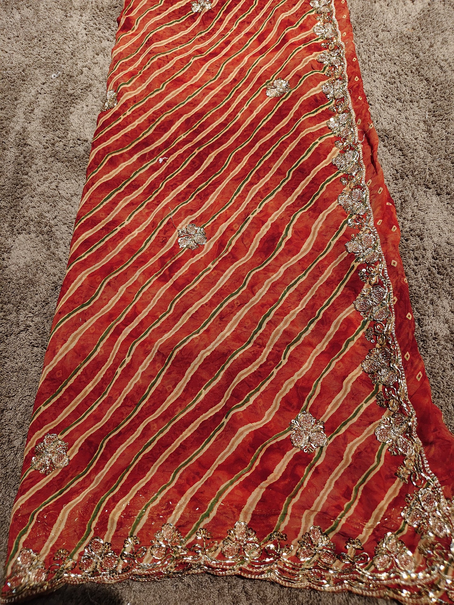 Beautiful Rust Color Lahariya Designer Saree with Heavy Border and Blouse Piece