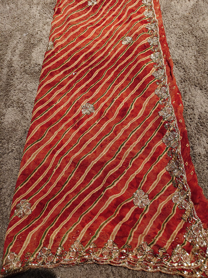 Beautiful Rust Color Lahariya Designer Saree with Heavy Border and Blouse Piece