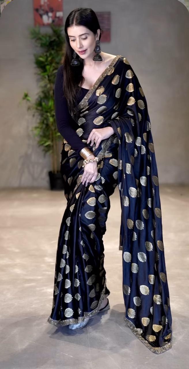 Black and Gold Pure Banarasi Saree with Designer Border and Same Fabric Blouse Piece.