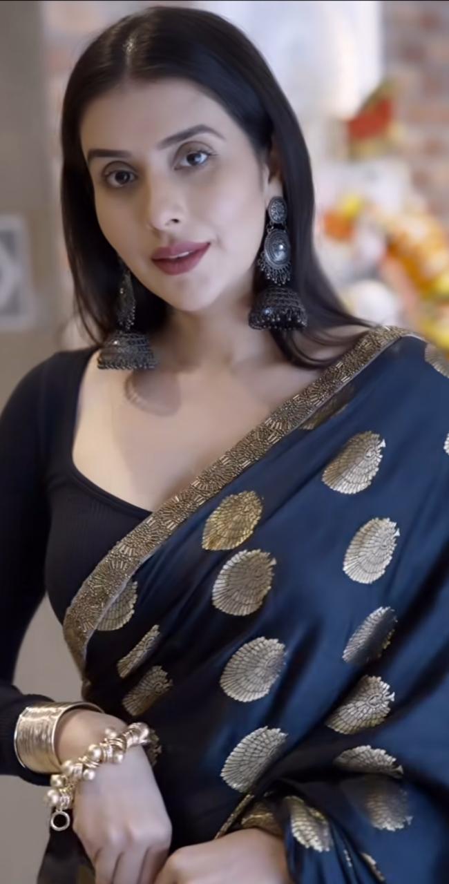 Black and Gold Pure Banarasi Saree with Designer Border and Same Fabric Blouse Piece.