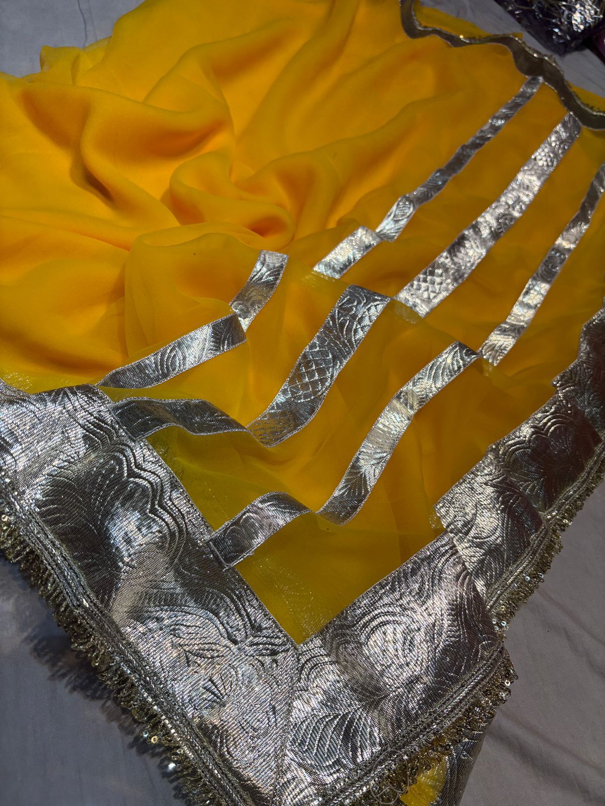 Yellow colour Celebrity Inspired Gota Chiffon Saree with Same Fabric Blouse in Running