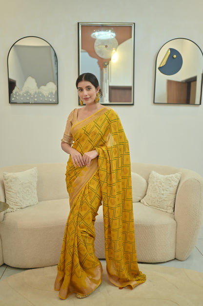 Beautiful Yellow Color Bandhini Mosmelo Saree with Designer Border