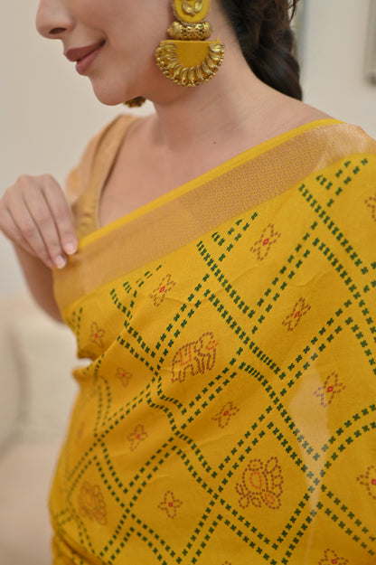 Beautiful Yellow Color Bandhini Mosmelo Saree with Designer Border