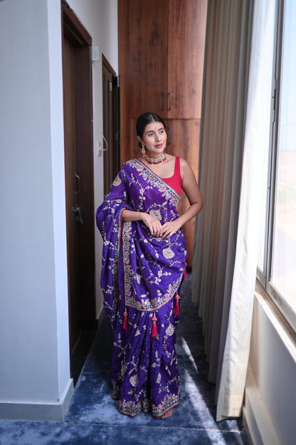 Heavy work Purple Silk Saree with Beautiful Tussles at the Pallu and Heavy Pink Contrast Blouse. You can call it Madhuri Dixit inspired “Hum Aapke hain Koun Saree “