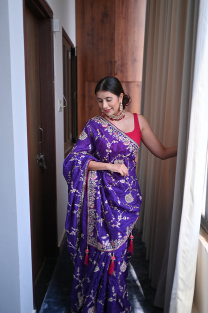 Heavy work Purple Silk Saree with Beautiful Tussles at the Pallu and Heavy Pink Contrast Blouse. You can call it Madhuri Dixit inspired “Hum Aapke hain Koun Saree “