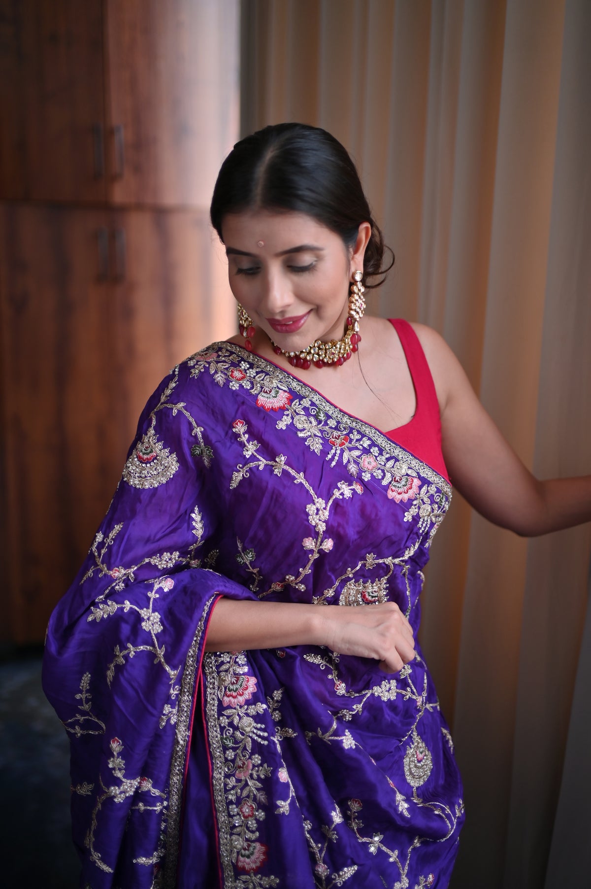 Heavy work Purple Silk Saree with Beautiful Tussles at the Pallu and Heavy Pink Contrast Blouse. You can call it Madhuri Dixit inspired “Hum Aapke hain Koun Saree “