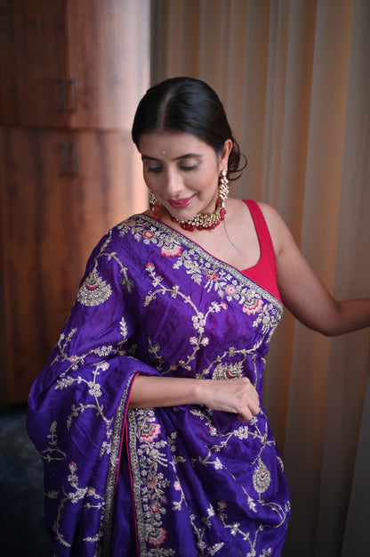 Heavy work Purple Silk Saree with Beautiful Tussles at the Pallu and Heavy Pink Contrast Blouse. You can call it Madhuri Dixit inspired “Hum Aapke hain Koun Saree “