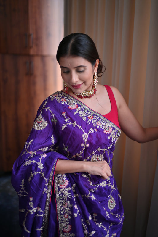 Heavy work Purple Silk Saree with Beautiful Tussles at the Pallu and Heavy Pink Contrast Blouse. You can call it Madhuri Dixit inspired “Hum Aapke hain Koun Saree “