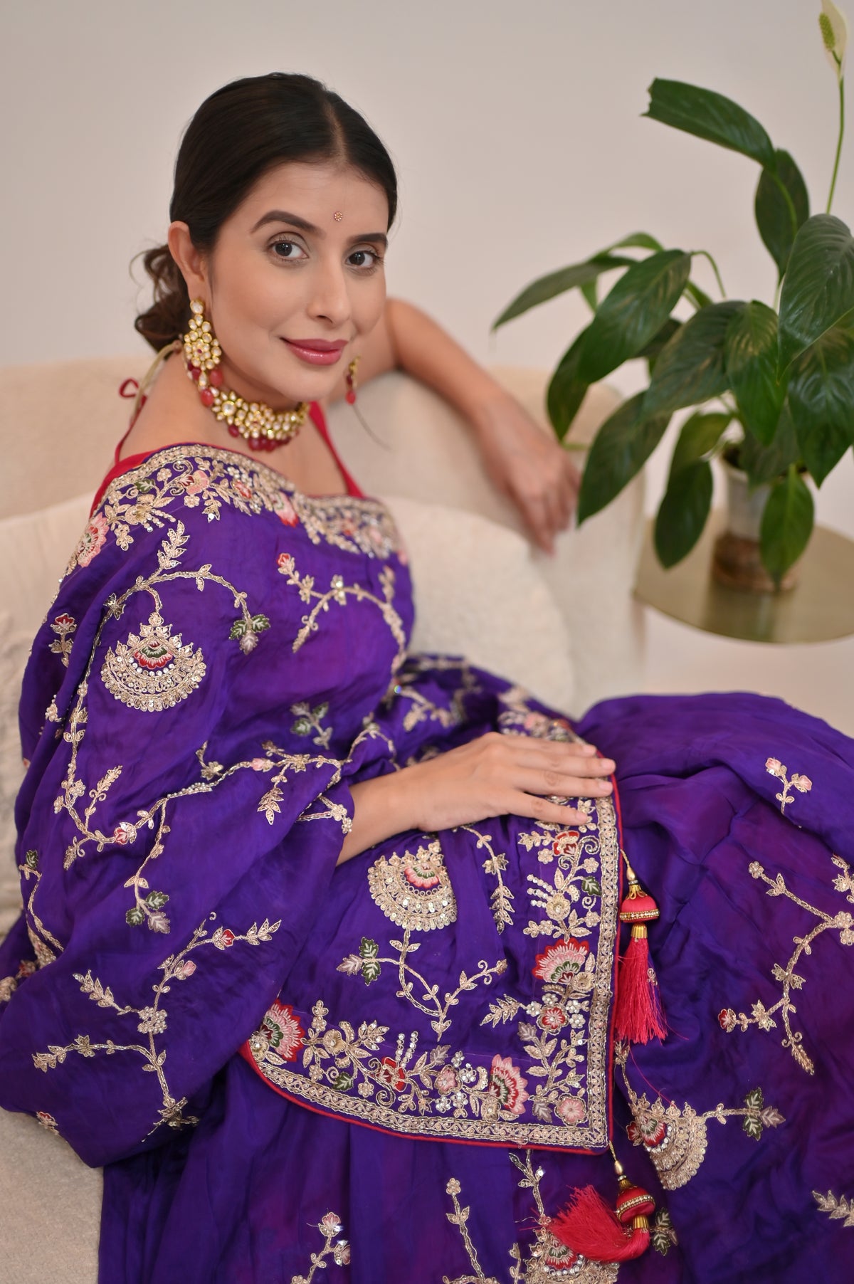 Heavy work Purple Silk Saree with Beautiful Tussles at the Pallu and Heavy Pink Contrast Blouse. You can call it Madhuri Dixit inspired “Hum Aapke hain Koun Saree “