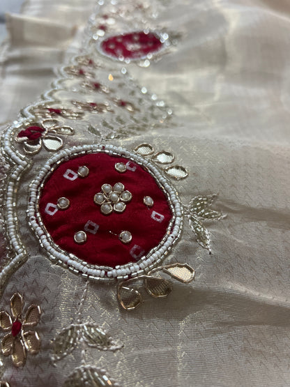 Beautiful Ceam Tissue Saree with Bandini and Gota Touch Zardozi Work and Red Colour Blouse with Gota and Zardozi work on Sleeves and Back