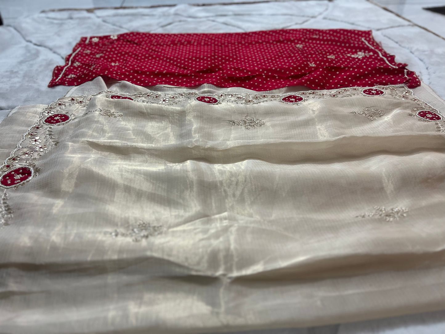 Beautiful Ceam Tissue Saree with Bandini and Gota Touch Zardozi Work and Red Colour Blouse with Gota and Zardozi work on Sleeves and Back