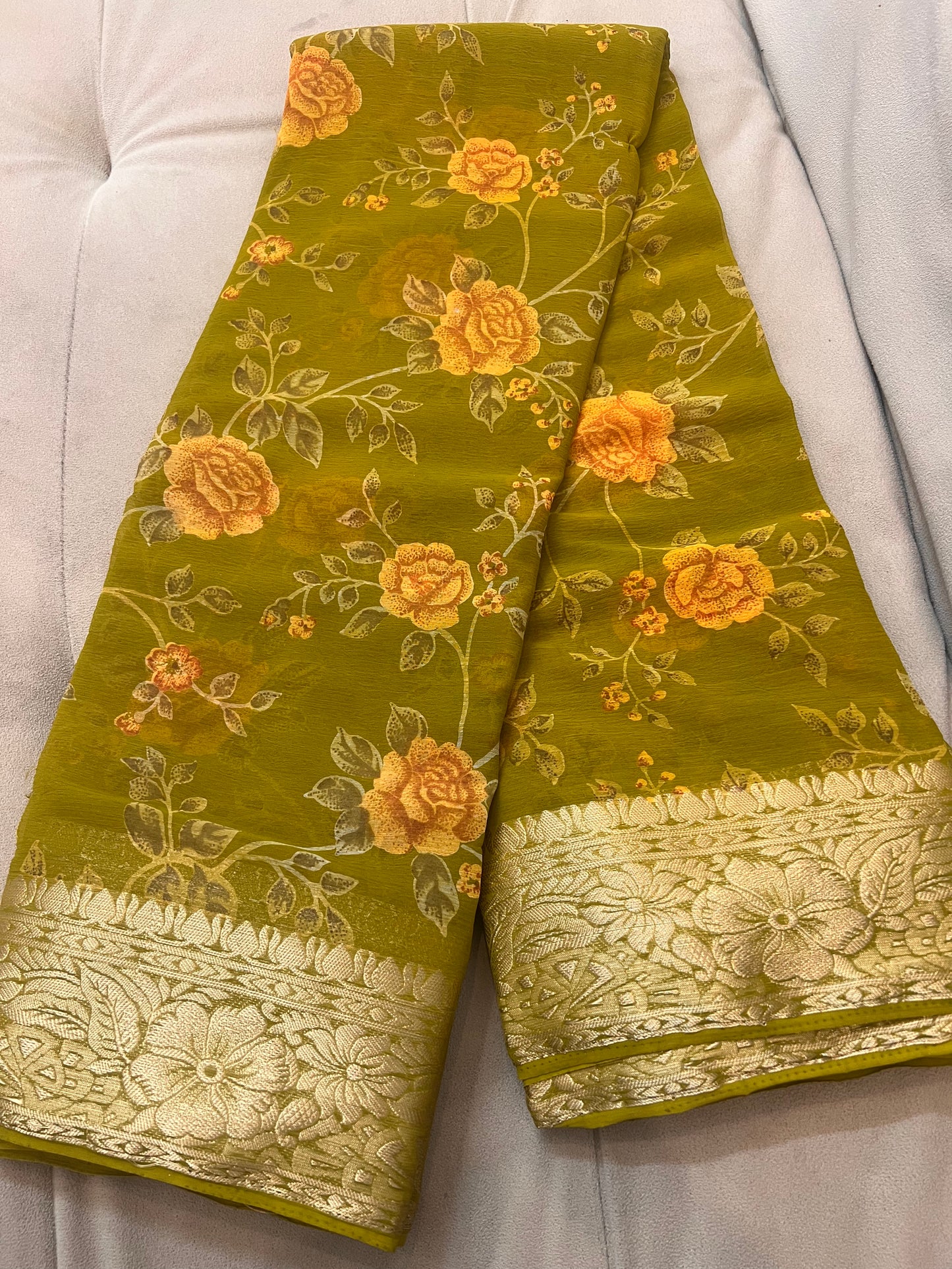 Mehandi Green Beautiful Printed Crepe Sarees with Heavy Border and Same Blouse Piece