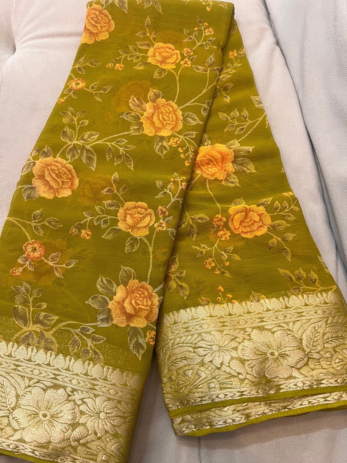 Mehandi Green Beautiful Printed Crepe Sarees with Heavy Border and Same Blouse Piece