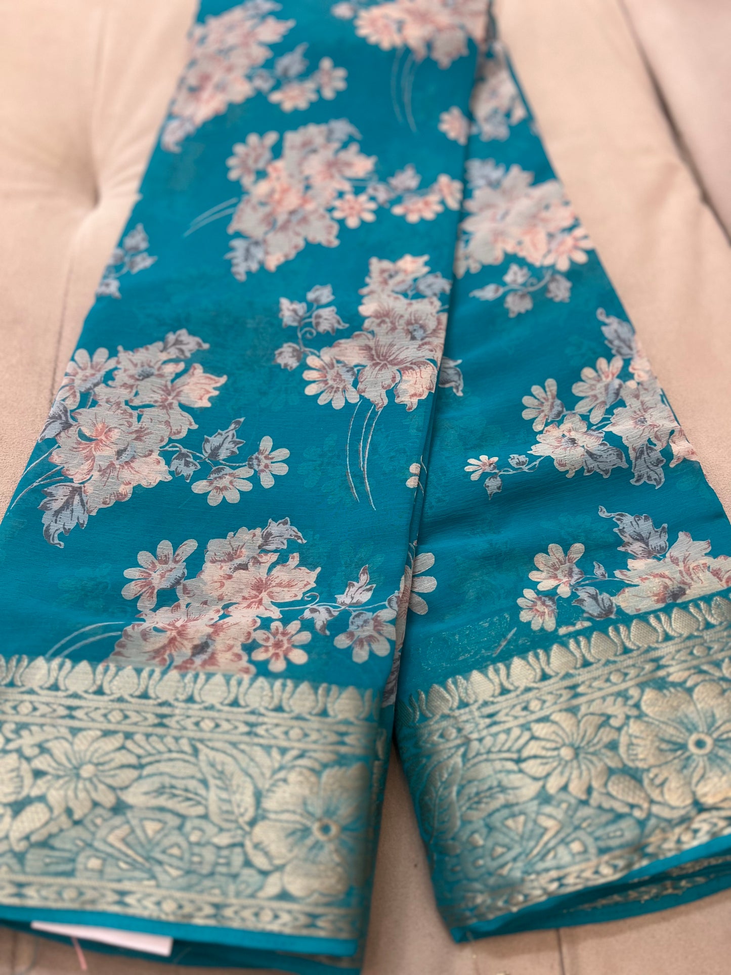 Sky Blue Beautiful Printed Crepe Sarees with Heavy Border and Same Blouse Piece