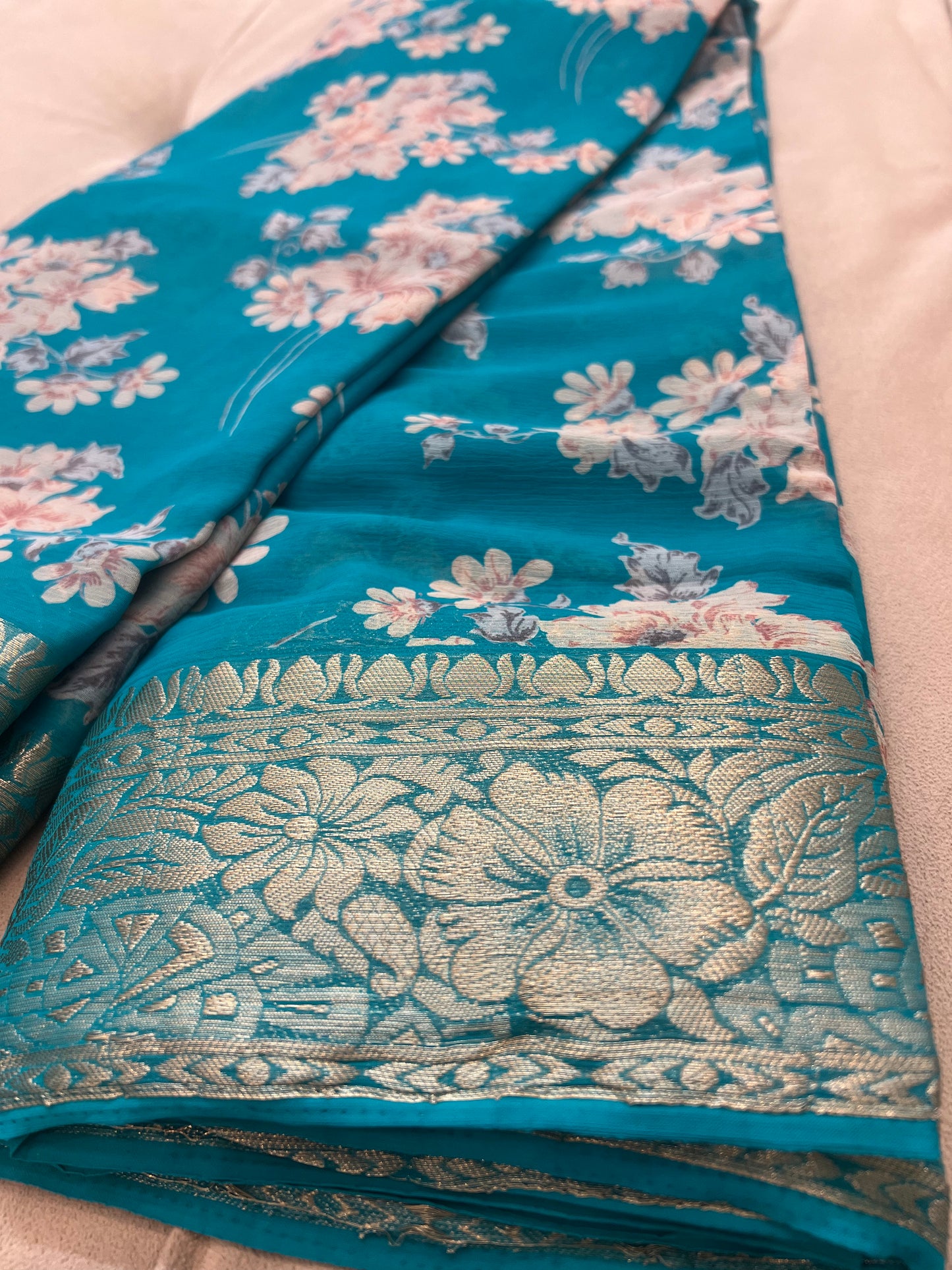 Sky Blue Beautiful Printed Crepe Sarees with Heavy Border and Same Blouse Piece