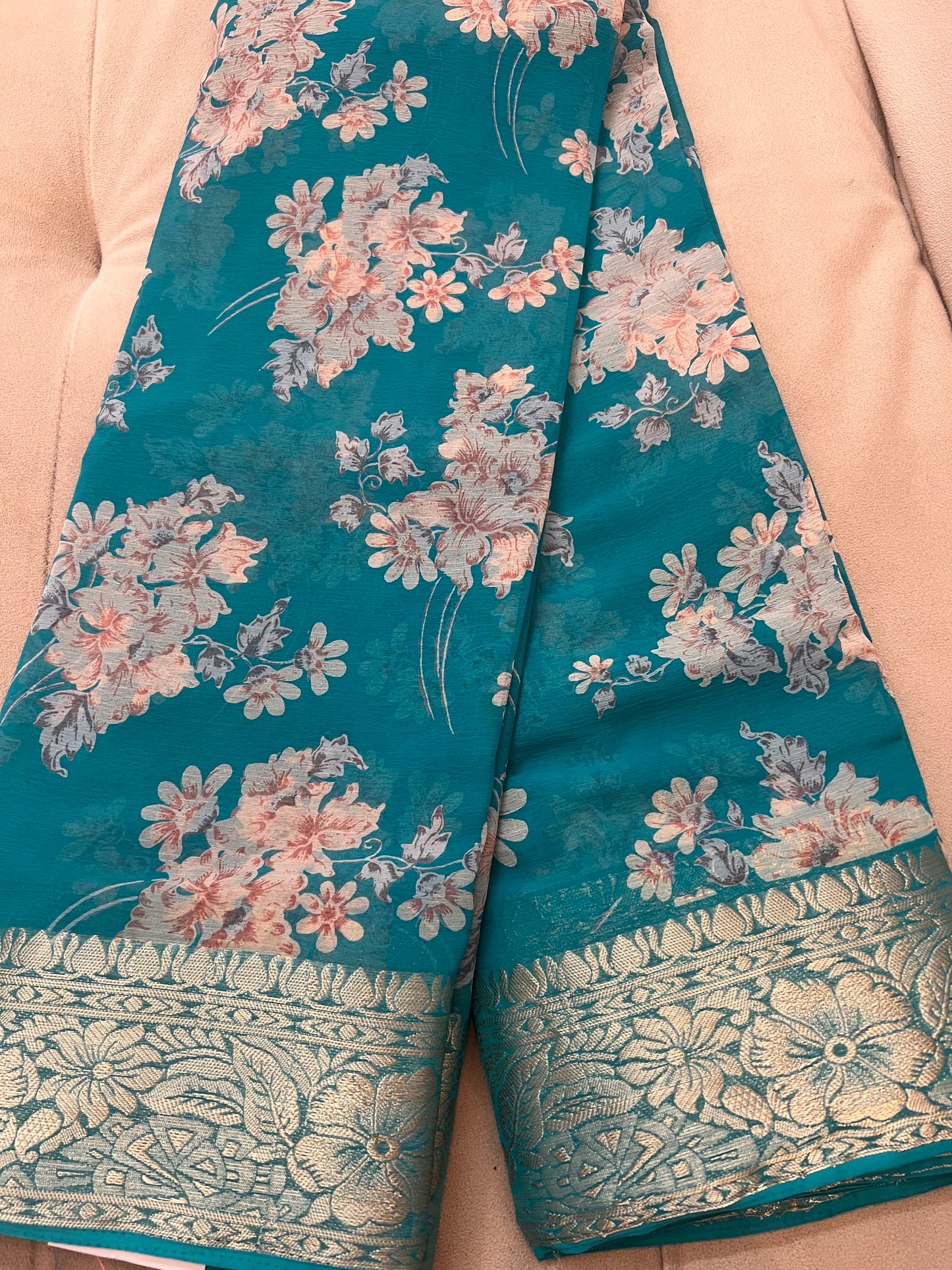 Sky Blue Beautiful Printed Crepe Sarees with Heavy Border and Same Blouse Piece
