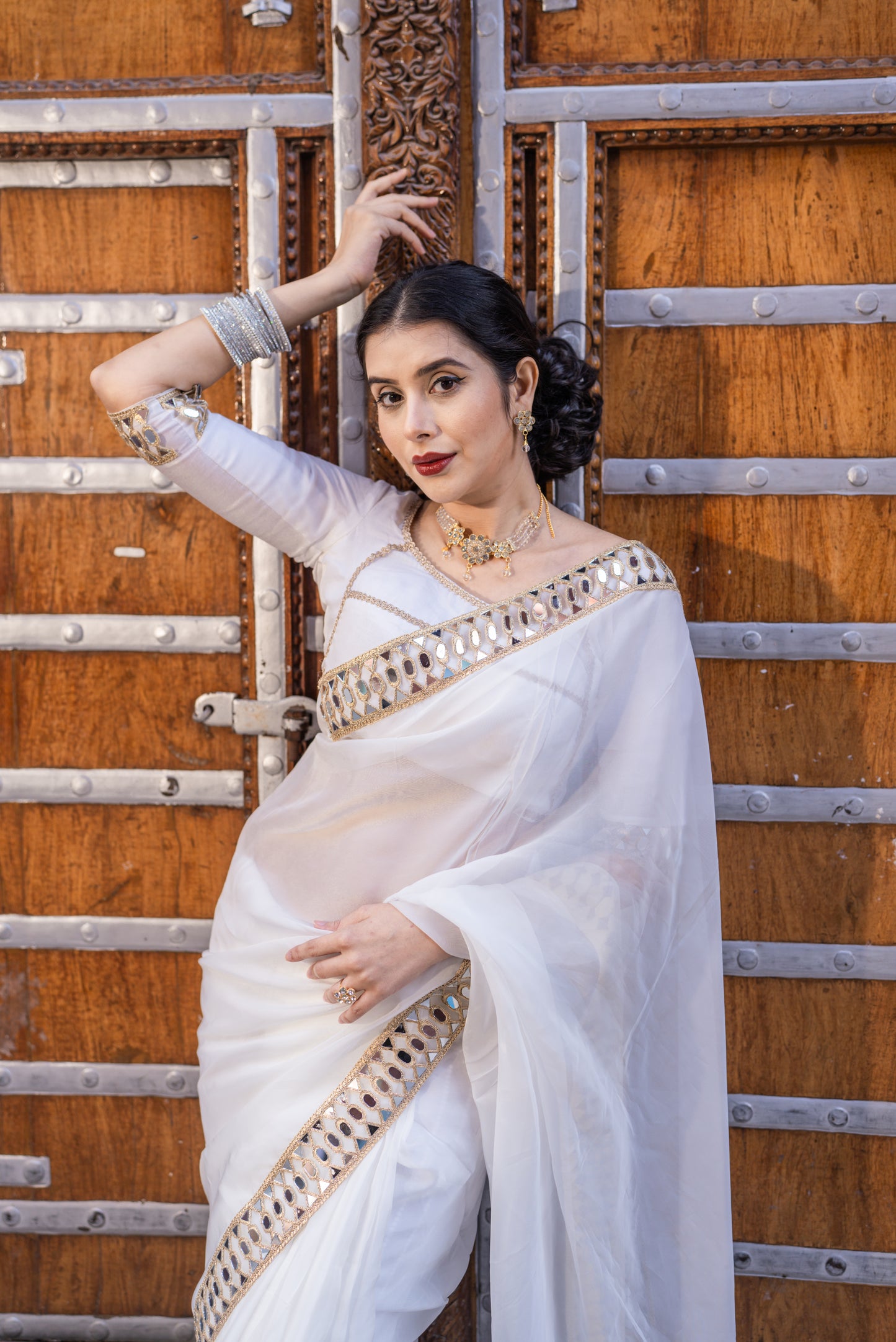 White organza mirror work saree with same stitched blouse