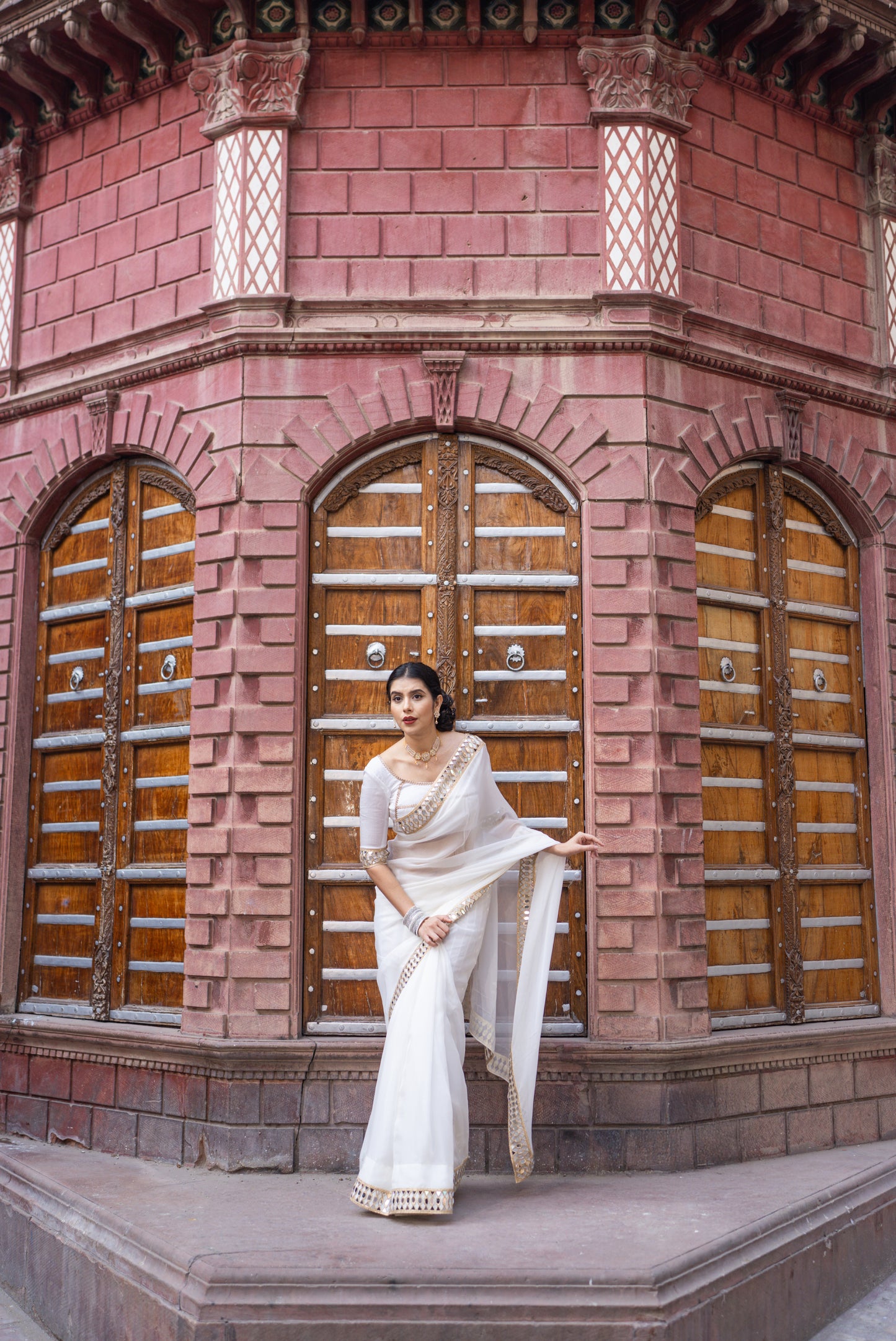 White organza mirror work saree with same stitched blouse