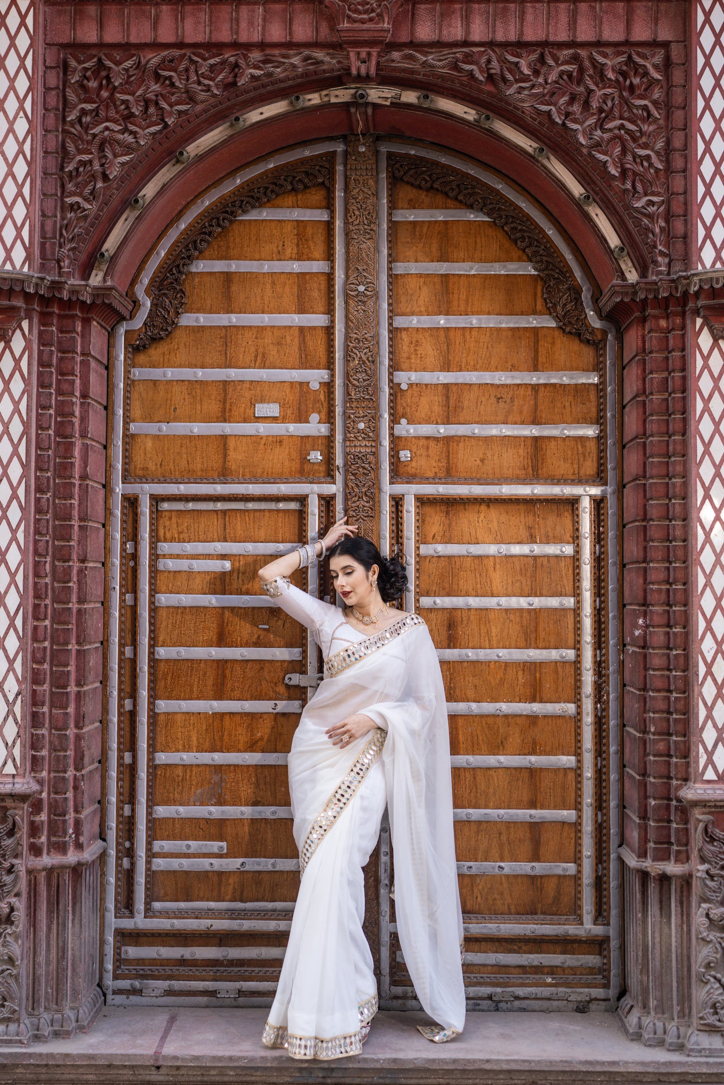 White organza mirror work saree with same stitched blouse